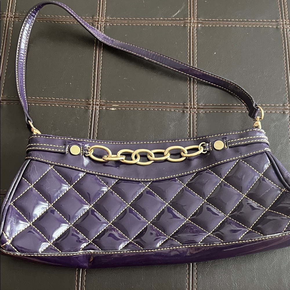 Maxx New York Signature quilted purple bag with gold chains detail